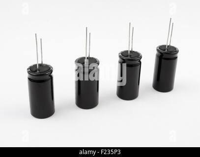 Electrolytic capacitors on white background Stock Photo
