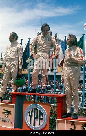 The podium at the VIII Gran Premio de la Republica Argentina 24th January 1971, Henri Pescarolo 2nd, Chris Amon winner and Carlos Reutemann  3rd Stock Photo