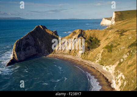 View towards Durdle Door from the South West Coast Path near Lulworth on Dorset's Jurassic Coast, England, UK Stock Photo