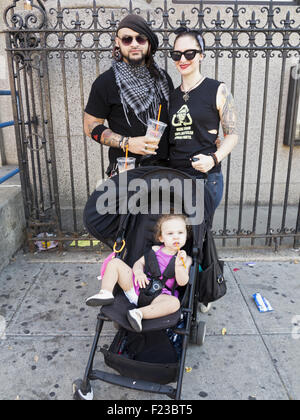 Hip couple with young daughter in the Williamsburg section of Brooklyn, New York. Stock Photo
