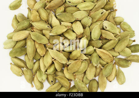 Cardamom seeds on white background Stock Photo