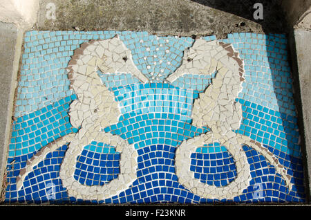 Hippocampus on mozaic patchwork blue and white Stock Photo