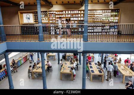 Madrid Spain,Hispanic ethnic Centro,Plaza de la Puerta del Sol,Apple Store,interior inside,display sale,case,showroom,shopping shopper shoppers shop s Stock Photo