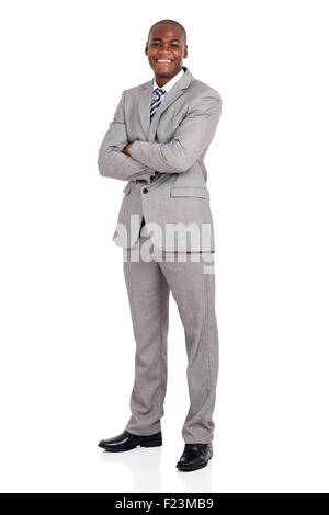 handsome young African American businessman with arms folded Stock Photo