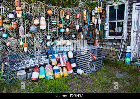 Fishing gear and equipment in the port. Lay out various fishing nets,  bobbers, mooring line, floats. Preparing to sail. Fishing at the sea.  Drying and Stock Photo - Alamy