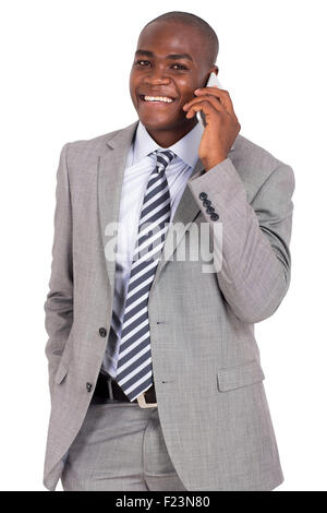 handsome young African businessman talking on smart phone Stock Photo