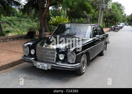 Old black Mercedes car parked in street vintage Stock Photo