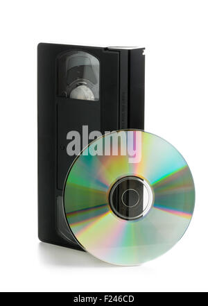 Analog video cassette with DVD disc - old movies backup or transfer concept Stock Photo