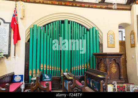 The organ in the famous St Just in Roseland church in Cornwall, UK. Stock Photo