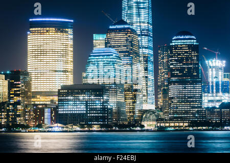 View of the Lower Manhattan skyline at night, from Exchange Place, in Jersey City, New Jersey. Stock Photo
