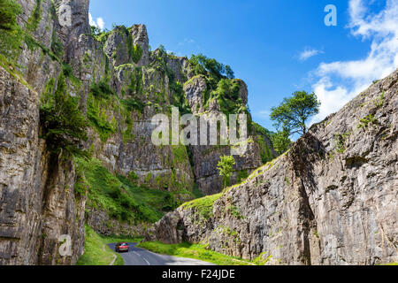 Cheddar Gorge, Omerset. Car on the road through the Gorge, Cheddar, Somerset, England, UK Stock Photo