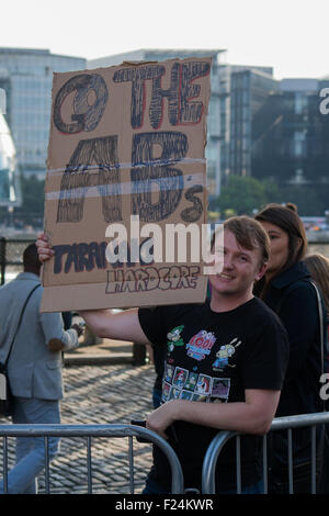 London, UK. 11th September 2015. All Blacks fan with a placard after meeting the New Zealand team during their welcoming ceremony for the 2015 Rugby World Cup at Tower of London. 20 teams from around the world will be competing to win the Webb Ellis Cup and declared RWC 2015 winners. New Zealand are the current title holders, winning the trophy in 2011. Credit: Elsie Kibue / Alamy Live News Stock Photo