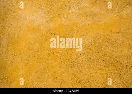 Background from wall with an orange plaster Stock Photo