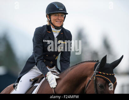 Blair Atholl, Scotland, UK. 11th September, 2015. in action during their dressage test on the second day.  The Longines FEI European Eventing Championships 2015 Blair Castle. Credit:  Stephen Bartholomew/Alamy Live News Stock Photo