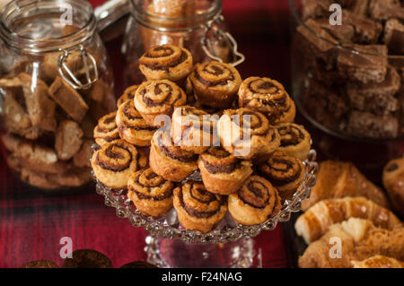Display of cinnamon buns arranged on a glass dish Stock Photo