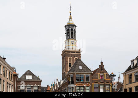 Historical buildings and the church tower of the hanseatic city Kampen in the Netherlands Stock Photo