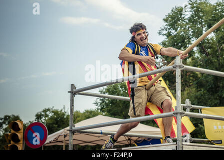 Sept. 11, 2015 - A catalan pro-independence supporters waves a giant flag at the end of the manifestation in Barcelona's Meridiana Street on Catalonia's national day for the independence from Spain © Matthias Oesterle/ZUMA Wire/Alamy Live News Stock Photo