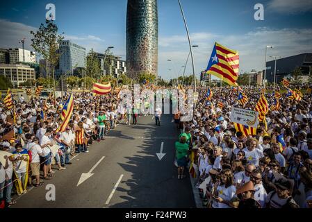 Sept. 11, 2015 - Thousands of Catalans in white shirts fill Barcelona's Meridiana Street waving flags as they rally on Catalonia's national day to claim the independence from Spain © Matthias Oesterle/ZUMA Wire/Alamy Live News Stock Photo