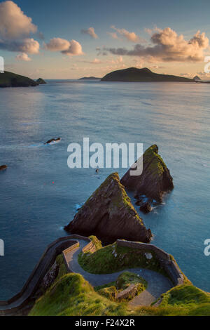 Sunset over windy road to Dunquin Harbor, Dunquin, County Kerry, Republic of Ireland Stock Photo