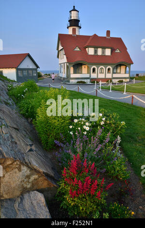 Portland Head Lighthouse adorned in Azaleas in Portland, Maine Stock