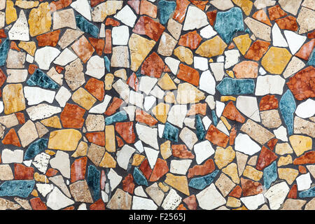 Colorful stone mosaic with chaotic pattern, seamless background photo texture Stock Photo