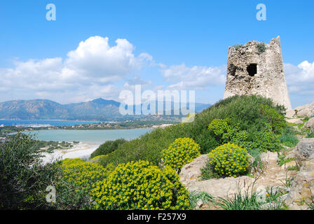 Background of spanish ancient toer of Porto Giunco in Villasimius (Sardinia) landscape Stock Photo
