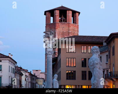 Winged lion and Ercole statue in Piazza Libertà, Udine - Italy Stock Photo