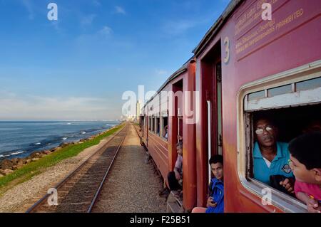 Sri Lanka, Colombo, train from Colombo to Galle and the city in the background Stock Photo