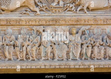 France, Loire, Charlieu, Saint Fortunatus' Abbey, late Romanesque tympanum, Christ in a mandorla, surrounded by the symbols of the Four Evangelists, XIIth century, Brionnais Stock Photo