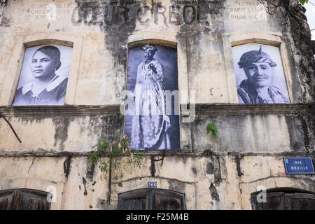 France, Martinique, Saint Pierre, the artist Anabell Guerrero made portraits of women, the Pierrotines, displayed on the walls of the city in tribute to the women of Saint Pierre Stock Photo