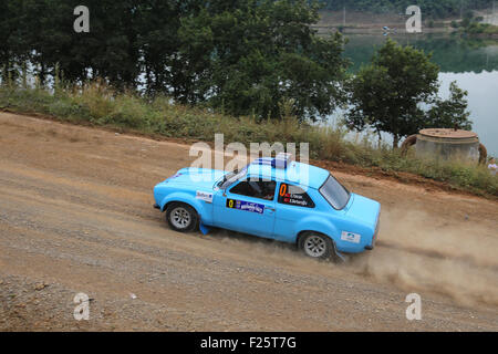 ISTANBUL, TURKEY - JULY 25, 2015: Ercan Tokcan drives safety car of Bosphorus Rally 2015, Deniz stage Stock Photo