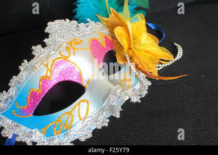 mask for masquerade with ornaments on a black background Stock Photo