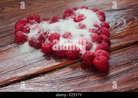 Heart laid out from a raspberry sugar Stock Photo