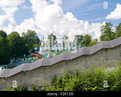 Monastery behind a wall in Pechory (near Pskov, Russia) Stock Photo