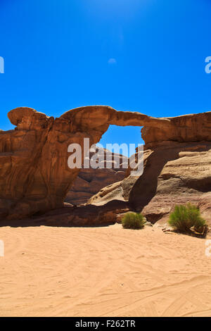 Natural arch bridge in Wadi Rum desert, Jordan Stock Photo