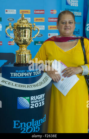 London, UK. 12th September 2015. The Webb Ellis Cup on display at Willesden Green Cultural Center during the opening of the new library as part of the RWC Trophy Tour. The trophy in the final days of the tour before the tournament kicks off on the 18th of September. Credit: Elsie Kibue / Alamy Live News Stock Photo