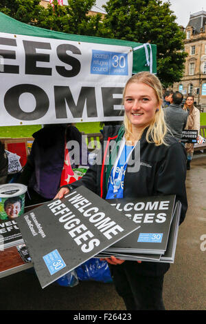 Glasgow, Scotland, UK. 12th September, 2015. Despite the heavy rain, about 2000 people attended a candlelight vigil in George Square, Glasgow showing support for the Syrian refugees. Recently Glasgow Council who already provides homes for 55 Syrians, announced  that it will take an additional 60 refugees. Frank McAveety, the newly appointed leader of Glasgow Council attended the rally. Credit:  Findlay/Alamy Live News Stock Photo