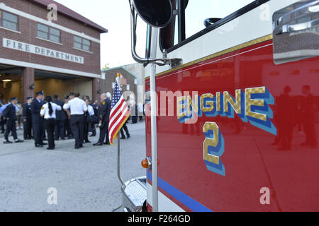 Bellmore, New York, USA. 11th Sep, 2015. A Bellmore fire engine is parked in front of the Bellmore Memorial Ceremony for 3 Bellmore volunteer firefighters and 7 residents who died due to 9/11 terrorist attack at NYC Twin Towers. Bellmore volunteer firefighters Lt. Kevin Prior and F.F. Adam Rand died on 9/11/2001, and F.F. Sean McCarthy died in 2008 due to illness related to working at scene of attack. © Ann Parry/ZUMA Wire/Alamy Live News Stock Photo