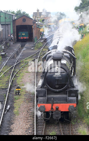 The preserved LMS 'Black 5' steam locomotive, 45379, pulling passenger carriages on the 'Watercress Line' Hampshire, England, UK Stock Photo