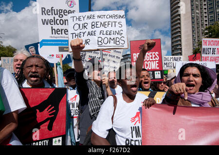 London, UK. 12th Sep, 2015. Thousands march through streets of London joining in solidarity with the Refugees crisis. Credit:  Janine Wiedel Photolibrary/Alamy Live News Stock Photo