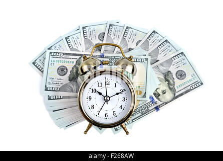 Alarm clock on money background Stock Photo
