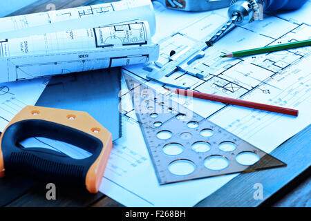 Architectural blueprints rolls and engineering items Stock Photo