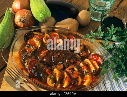 Greek vegetarian soufflé 'Briam' with courgettes, potatoes and eggplants Stock Photo