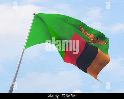 Zambia flag flying on clear sky. Stock Photo