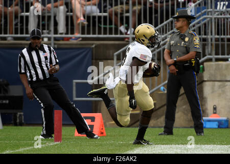 September 12, 2015 - Army Black Knights running back Joe Walker (5) scores a touchdown during the NCAA football game between the Army Black Knights and the Connecticut Huskies held at Pratt & Whitney Stadium Stadium at Rentschler Field in East Hartford Connecticut. The Connecticut Huskies defeated the Army Black Knights 22-17. Eric Canha/CSM Stock Photo