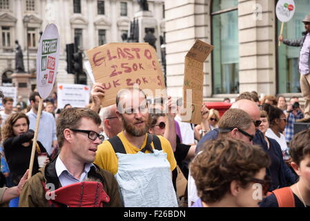 London, UK. 12th Sep, 2015. Thousands march through central London on a demonstration to say 'refugees welcome here'. Stock Photo