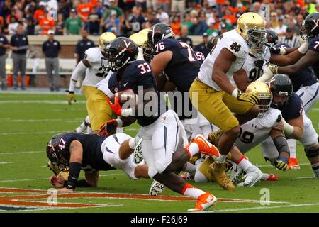 Charlottesville, Virginia, USA. 12th September, 2015. Virginia Cavaliers running back Olamide Zaccheaus (33) runs the ball during the NCAA Football game between the Notre Dame Fighting Irish and the Virginia Cavaliers at Scott Stadium in Charlottesville, VA. Credit:  Cal Sport Media/Alamy Live News Stock Photo