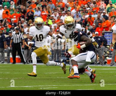 Charlottesville, Virginia, USA. 12th September, 2015. Virginia Cavaliers running back Taquan Mizzell (4) runs the ball during the NCAA Footbal game between the Notre Dame Fighting Irish and the Virginia Cavaliers at Scott Stadium in Charlottesville, VA. Credit:  Cal Sport Media/Alamy Live News Stock Photo