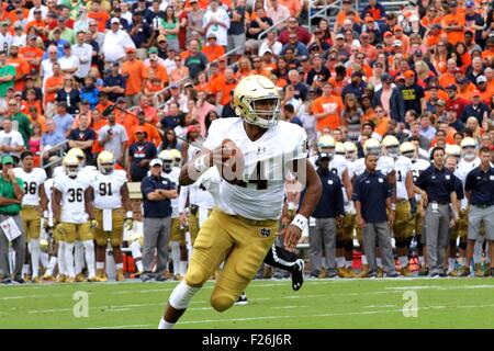 Charlottesville, Virginia, USA. 12th September, 2015. Notre Dame Fighting Irish quarterback DeShone Kizer (14) runs the ball during the NCAA Football game between the Notre Dame Fighting Irish and the Virginia Cavaliers at Scott Stadium in Charlottesville, VA. Credit:  Cal Sport Media/Alamy Live News Stock Photo