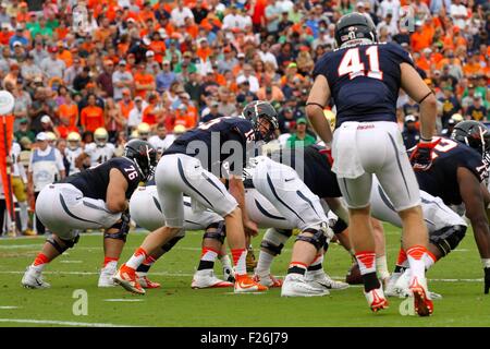 Charlottesville, Virginia, USA. 12th September, 2015. Virginia Cavaliers quarterback Matt Johns (15) under center during the NCAA Football game between the Notre Dame Fighting Irish and the Virginia Cavaliers at Scott Stadium in Charlottesville, VA. Credit:  Cal Sport Media/Alamy Live News Stock Photo